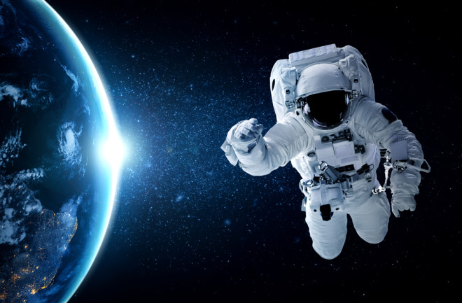 Astronaut spaceman do spacewalk while working for space station in outer space . Astronaut wear full spacesuit for space operation . Elements of this image furnished by NASA space astronaut photos.