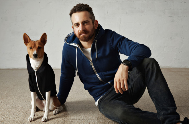 Dog and owner wearing matching outfits