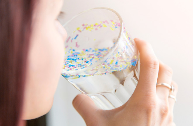 Girl drinks water polluted with microplastics