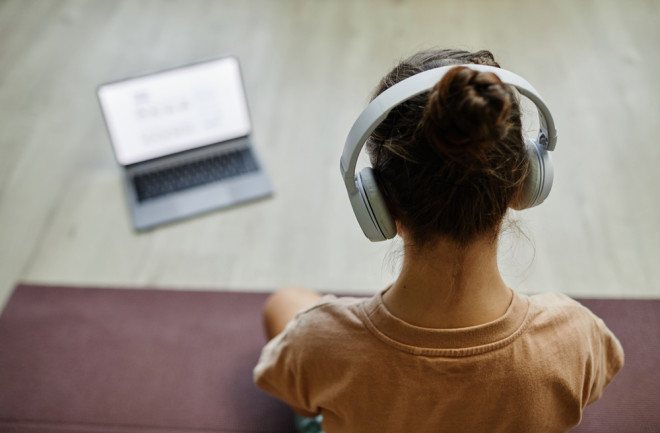 Child with noise-canceling headphones