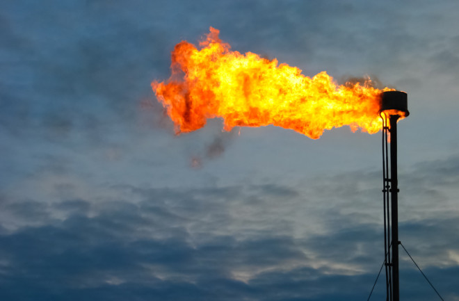 Burning oil gas flare