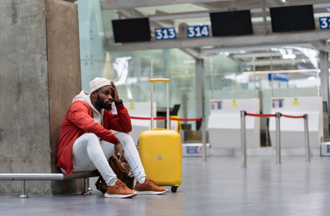 Fatigued person at an airport